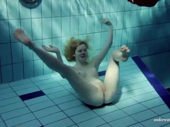 KiloPantyhose presents: Blonde goes for a swim and strips