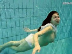 KiloPantyhose presents: Girl in white panties swims in pool