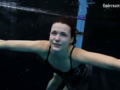 KiloPantyhose presents: Beautiful girl swims and smiles underwater