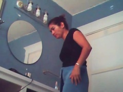 KiloPantyhose presents: Voyeur camera captures naked chick in bathroom