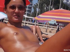 KiloPantyhose presents: Small tits girl with a great tan is topless at the beach