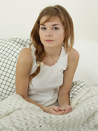 KiloPantyhose presents: Sweet teen brunette stripping naked in the bed